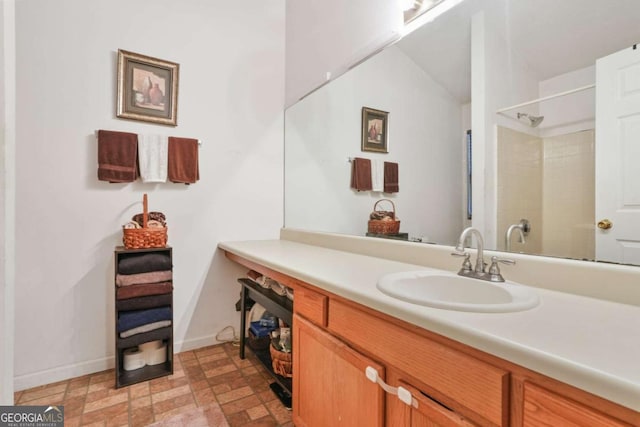 bathroom featuring vanity and walk in shower