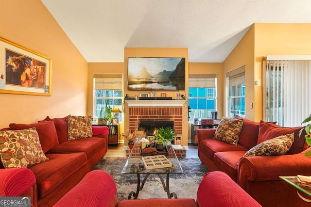 living room featuring a fireplace, vaulted ceiling, and dark hardwood / wood-style floors