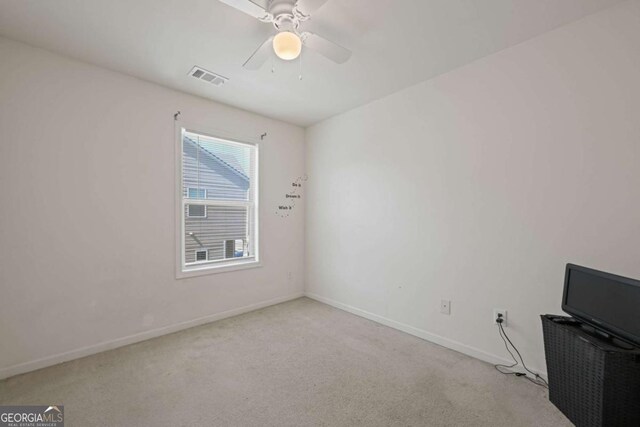 2657 Avanti Way, Decatur, GA 30035 - spare room featuring light carpet and ceiling fan