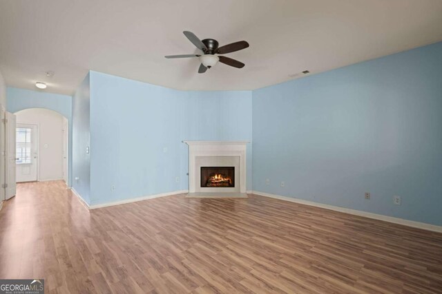 2657 Avanti Way, Decatur, GA 30035 - unfurnished living room featuring hardwood / wood-style flooring and ceiling fan