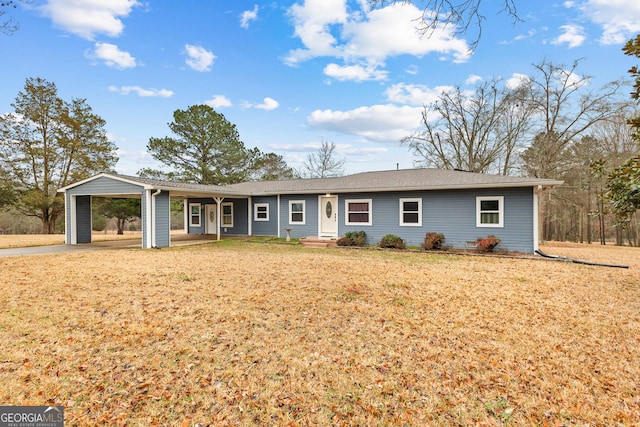 ranch-style home with a front yard