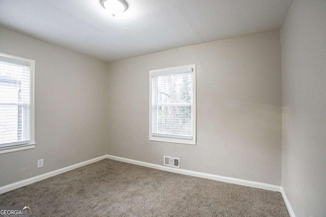 3234 Bluebird Ln, Decatur, GA 30032 - unfurnished room with carpet floors and a wealth of natural light