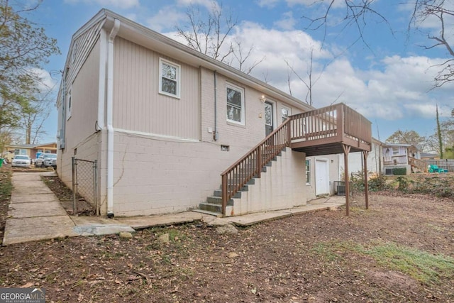 3234 Bluebird Ln, Decatur, GA 30032 - back of house featuring cooling unit and a deck