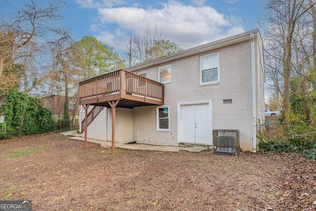 3234 Bluebird Ln, Decatur, GA 30032 - rear view of house featuring central AC and a deck