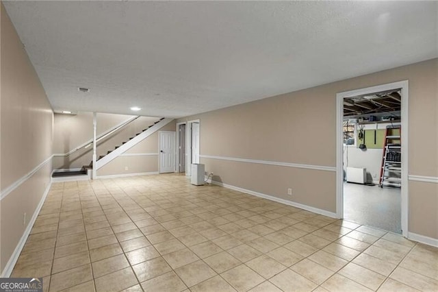 interior space featuring light tile patterned floors