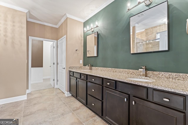 bathroom with vanity, ornamental molding, and a shower