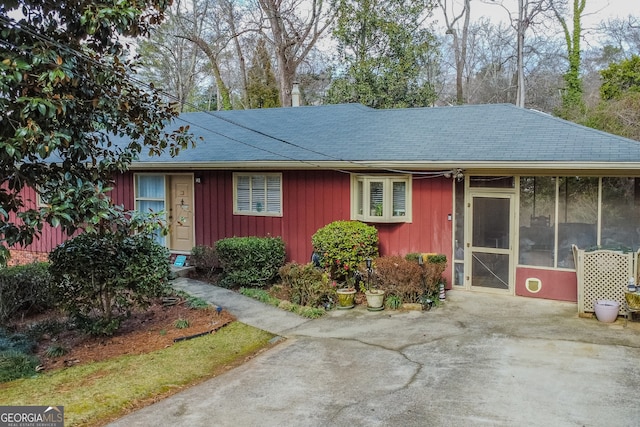 single story home with a sunroom