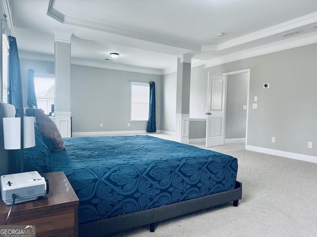 carpeted bedroom featuring ornate columns, ornamental molding, and multiple windows