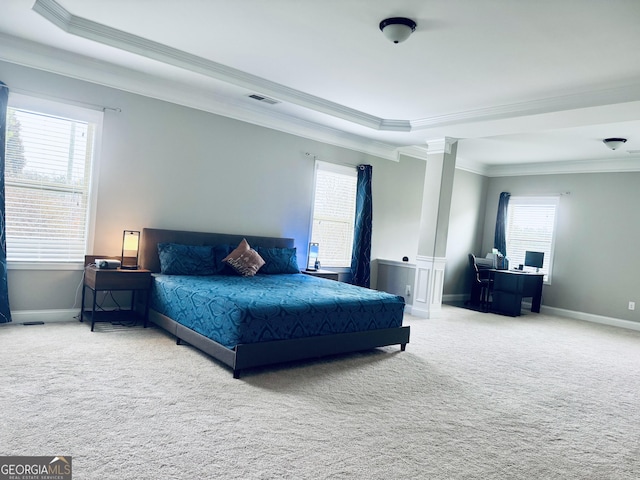 carpeted bedroom featuring baseboards, visible vents, and ornamental molding