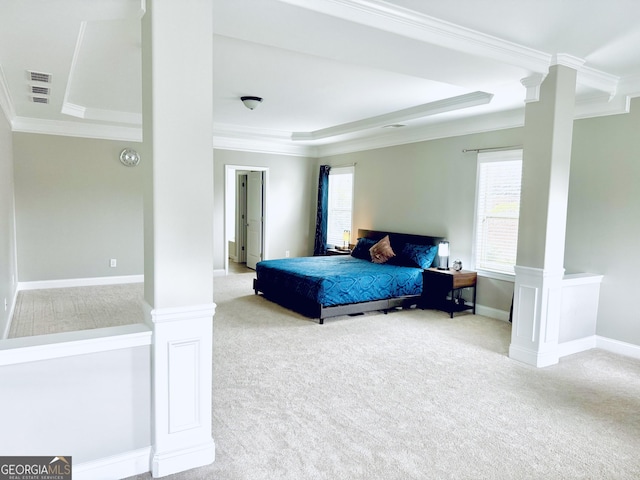 carpeted bedroom featuring ornamental molding, visible vents, decorative columns, and baseboards