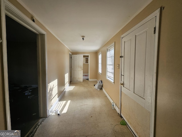 hallway featuring crown molding