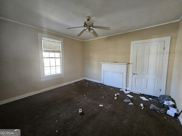 unfurnished living room with ornamental molding and ceiling fan