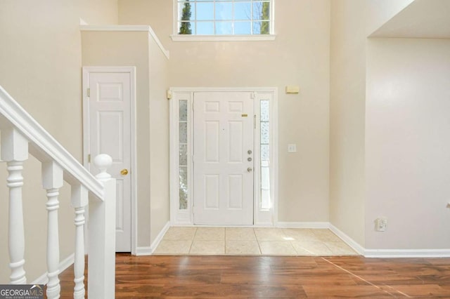 foyer with light hardwood / wood-style flooring