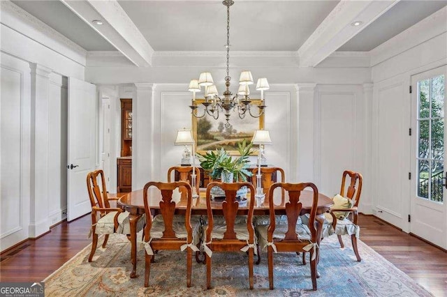 dining room featuring beamed ceiling, dark hardwood / wood-style flooring, crown molding, and a notable chandelier