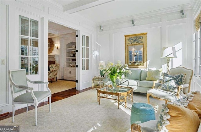 sunroom with beamed ceiling