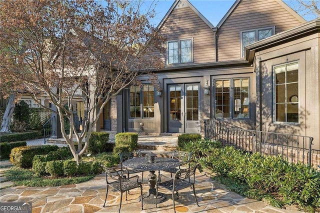 rear view of property with a patio