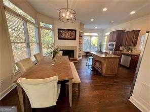 dining area with a notable chandelier and a wealth of natural light