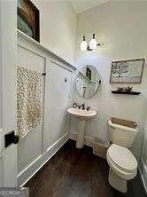 mudroom with dark hardwood / wood-style flooring