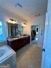 bathroom featuring tile patterned flooring