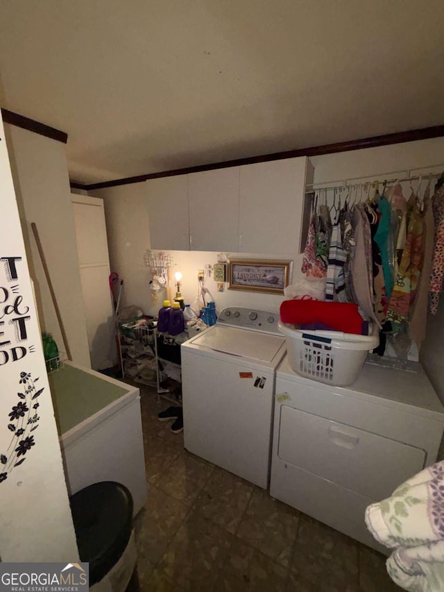 laundry room featuring washer and clothes dryer