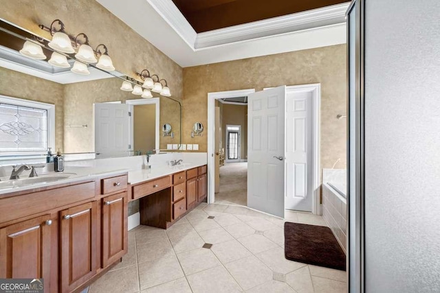 bathroom with vanity, tile patterned flooring, crown molding, and a relaxing tiled tub