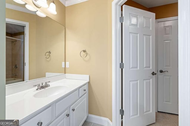 bathroom with vanity, tiled shower / bath combo, and tile patterned floors