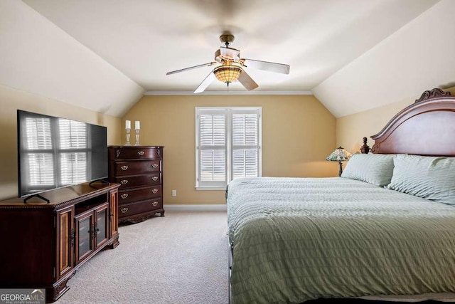 bedroom with vaulted ceiling, light carpet, and ceiling fan