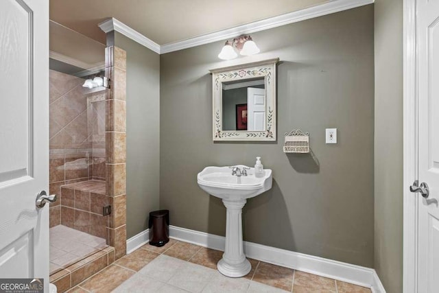 bathroom with ornamental molding, tile patterned flooring, and a shower with door