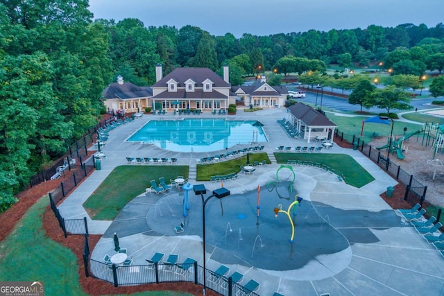 view of pool featuring an outdoor structure and a patio area