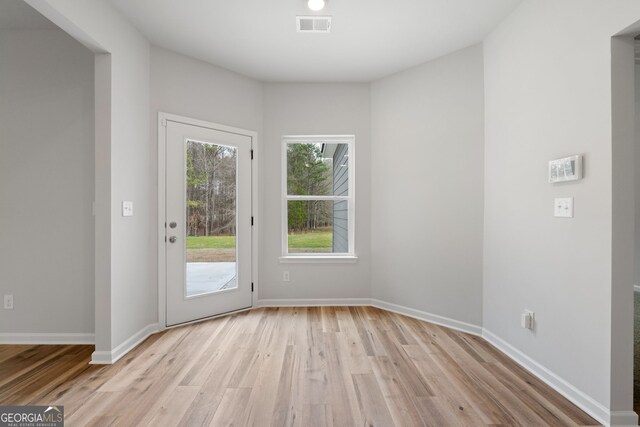 25 Patterson Dr, Franklin, GA 30217 - doorway featuring light wood-style flooring and baseboards