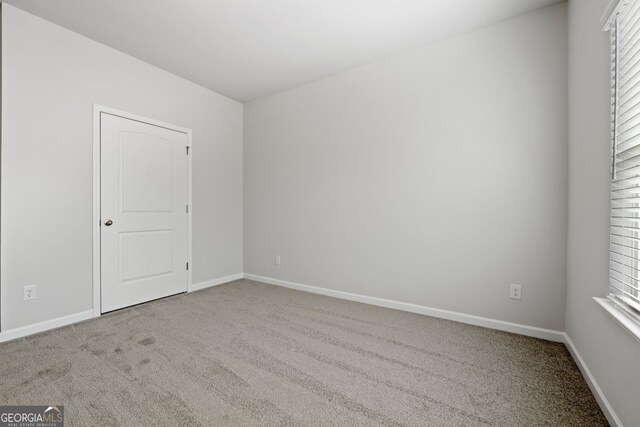 25 Patterson Dr, Franklin, GA 30217 - carpeted empty room with baseboards