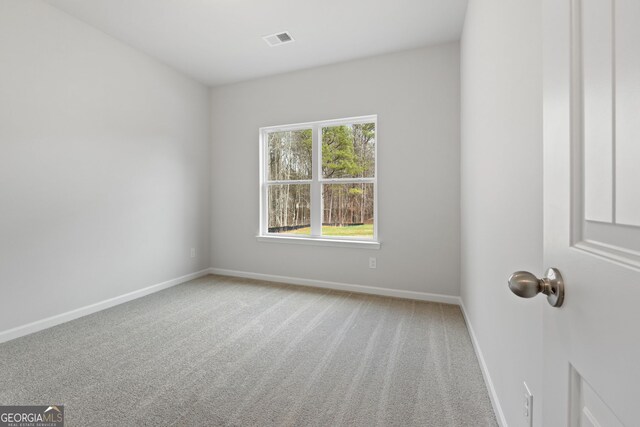 25 Patterson Dr, Franklin, GA 30217 - unfurnished room featuring baseboards and light colored carpet