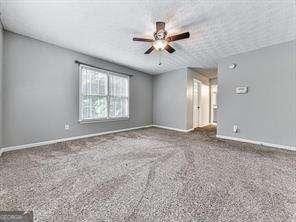 empty room with ceiling fan