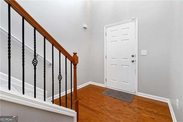 entrance foyer with hardwood / wood-style floors