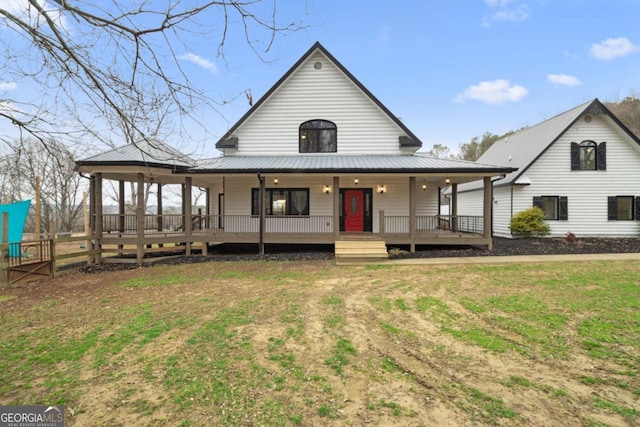 farmhouse-style home with a porch and a front yard