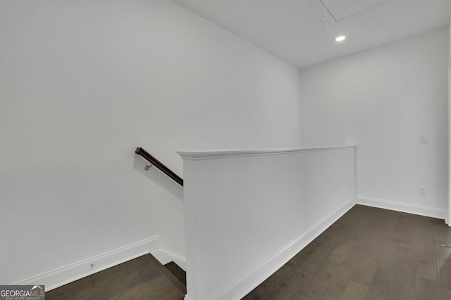 staircase featuring hardwood / wood-style floors