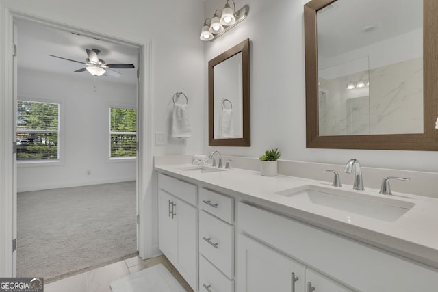 bathroom featuring vanity, a shower, and ceiling fan