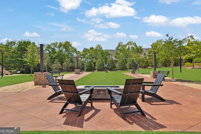 view of patio featuring an outdoor fire pit