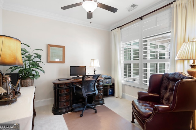 carpeted office with ornamental molding and ceiling fan