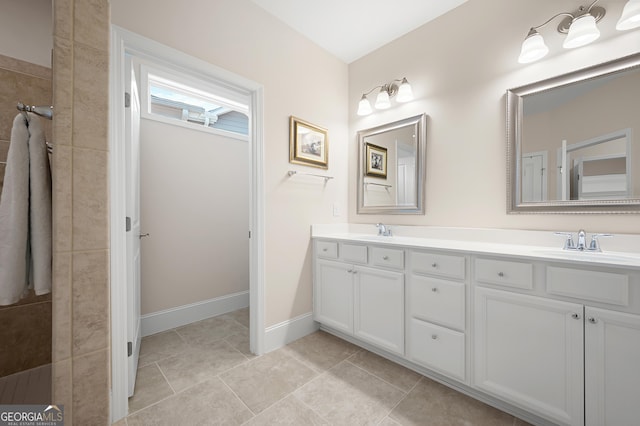 bathroom featuring vanity and tile patterned flooring