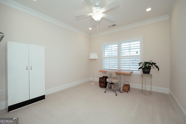 home office featuring ornamental molding, light colored carpet, and ceiling fan