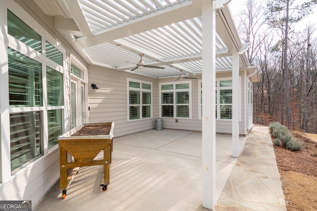 view of patio with ceiling fan and a pergola