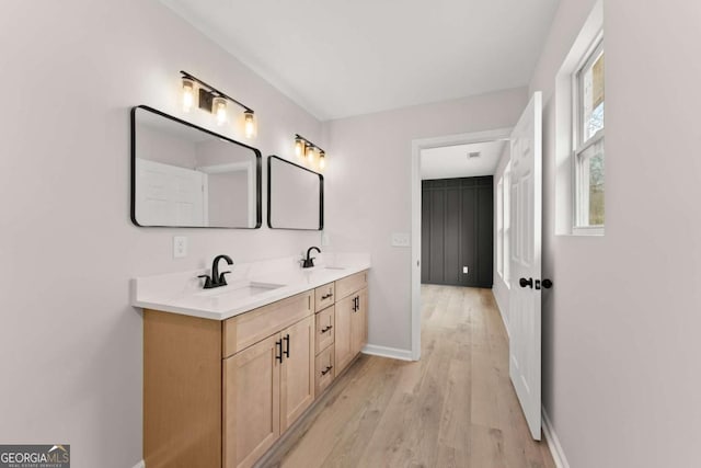 bathroom featuring vanity and hardwood / wood-style floors