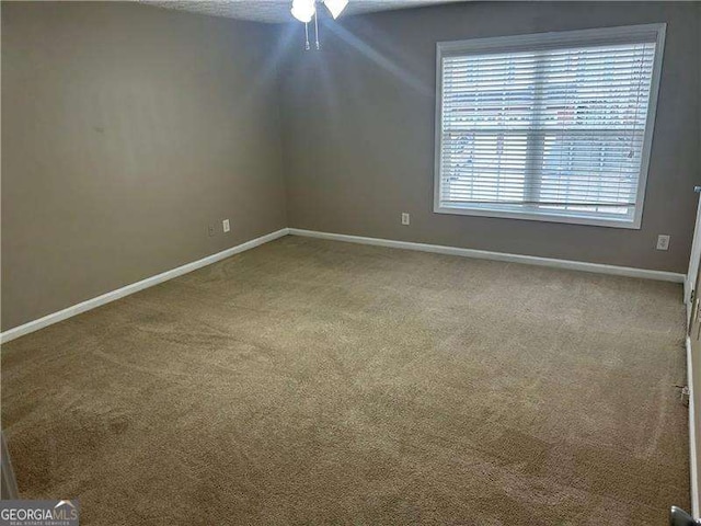 view of carpeted spare room