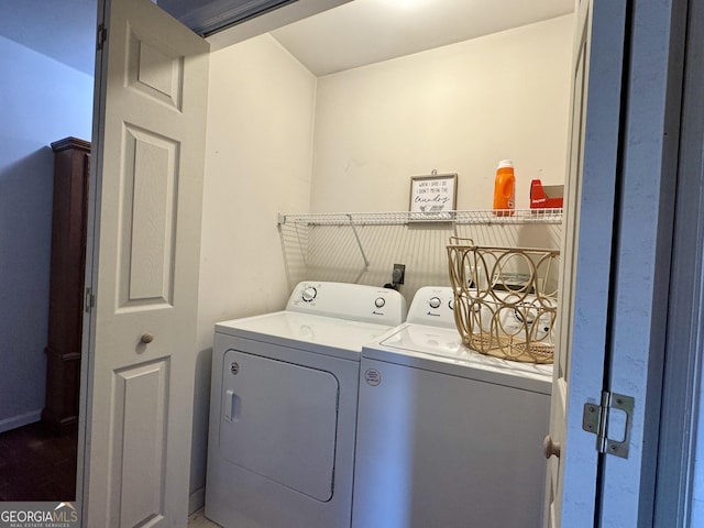 washroom with washer and dryer