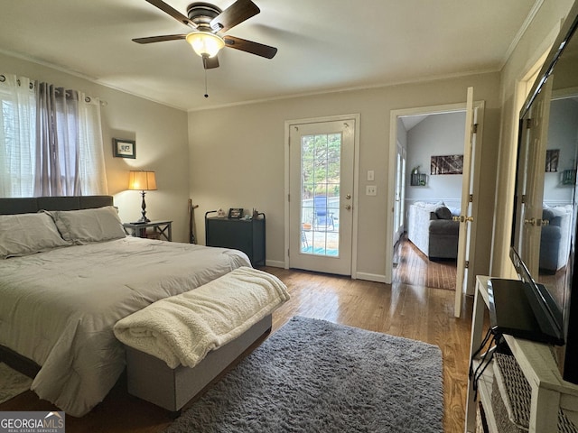 bedroom with ornamental molding, access to outside, light hardwood / wood-style floors, and ceiling fan