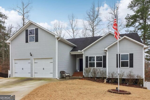 view of front of home with a garage