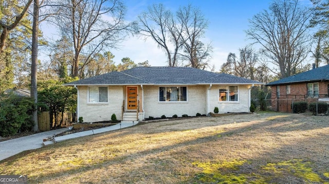 ranch-style house with a front yard