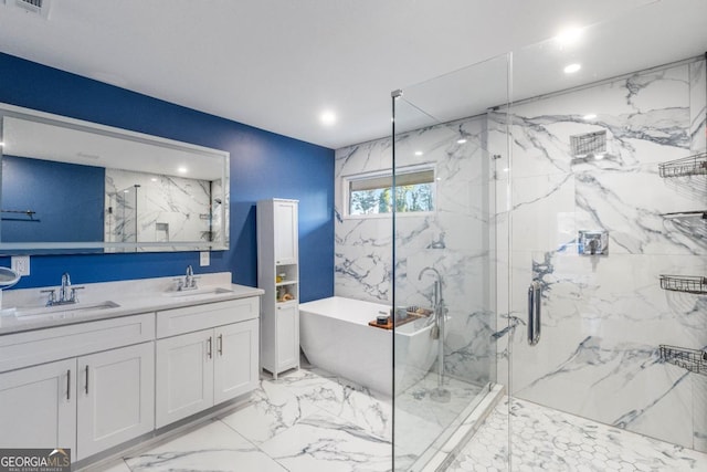 bathroom with vanity and separate shower and tub