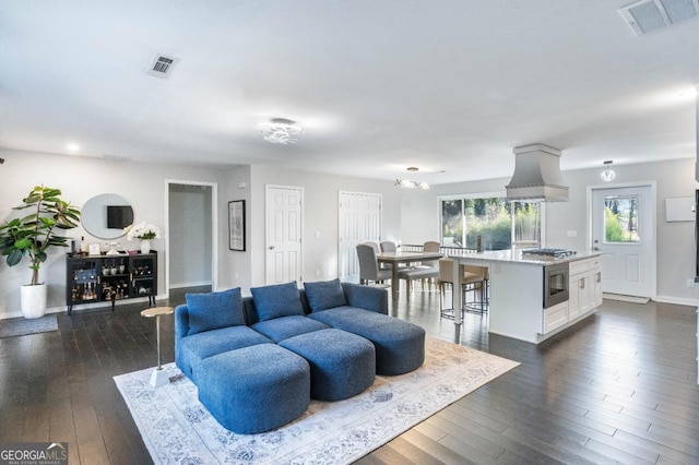 living room featuring dark hardwood / wood-style floors